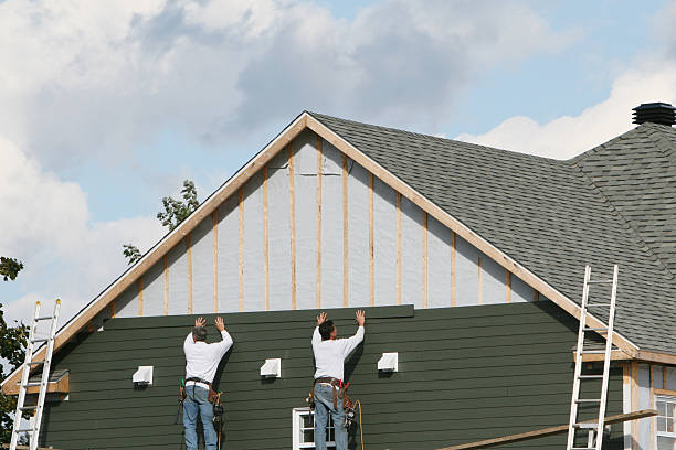 Professional Siding Replacement technician working in Ludlow Falls, OH